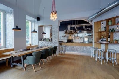 After Being Flooded Many Years, This Space Was Transformed into a Wonderfully Intimate Bistro