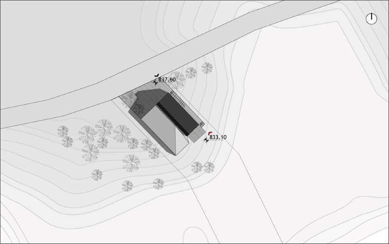 Mountain home built by combining and connecting two monolithic volumes (7)