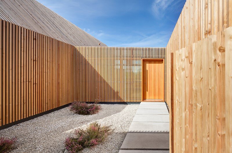 Wohnhaus aus Holz wooden-frame house heated by a geothermal heat pump (16)