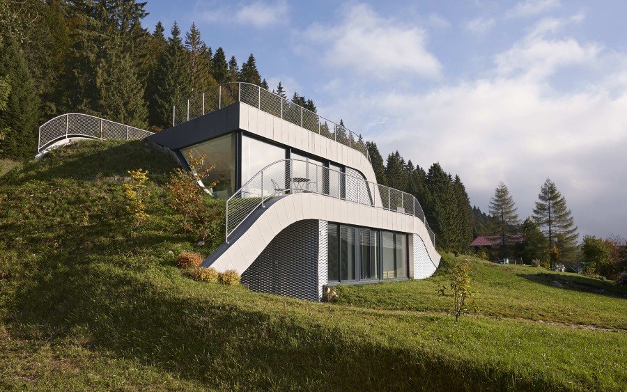 Jura House Blends into the Surrounding Hill (7)