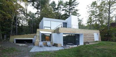 New England Lake Retreat with an Abstract Aesthetic