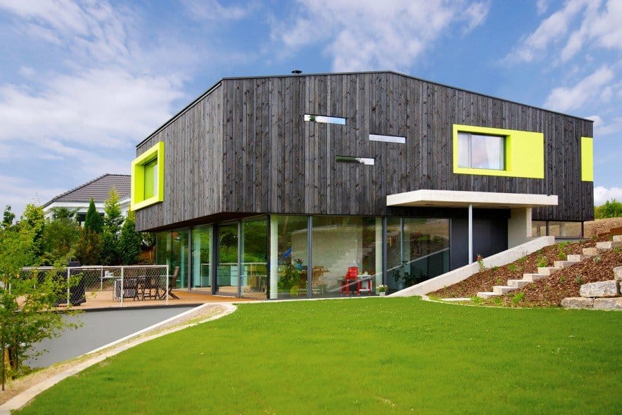 This German Family House is a Black Cuboid Supported by Glass Walls (1)