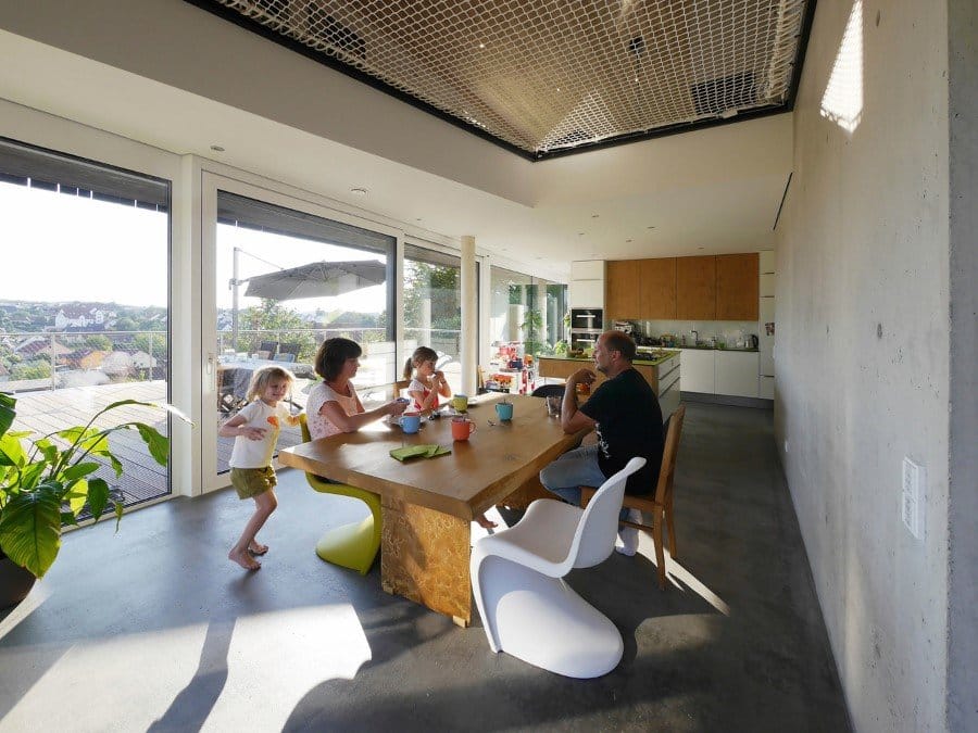 This German Family House is a Black Cuboid Supported by Glass Walls (10)