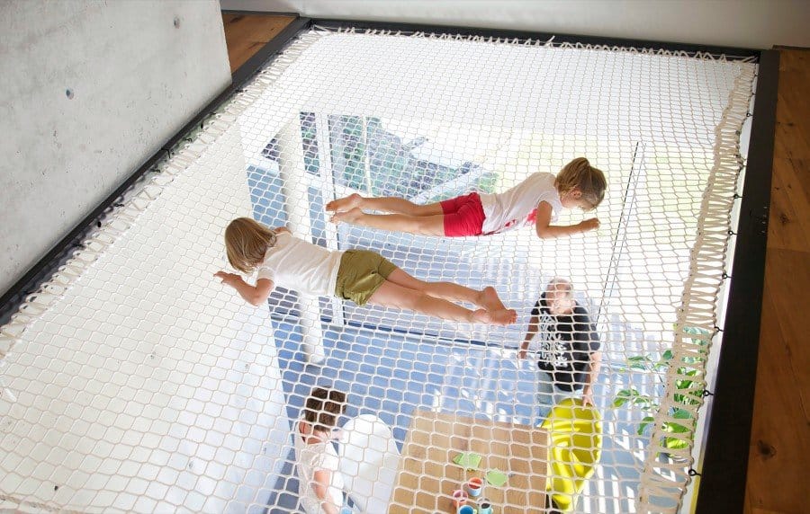 This German Family House is a Black Cuboid Supported by Glass Walls (4)