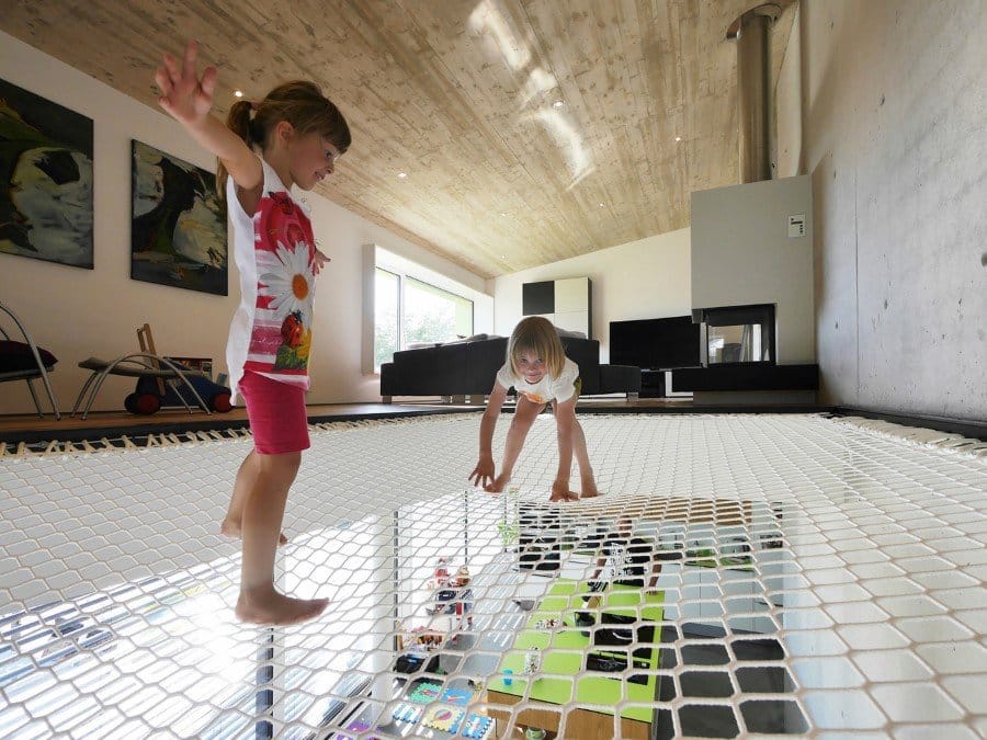 This German Family House is a Black Cuboid Supported by Glass Walls (5)