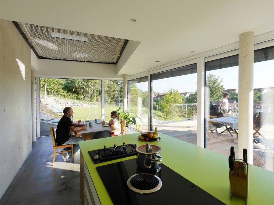 This German Family House is a Black Cuboid Supported by Glass Walls (9)