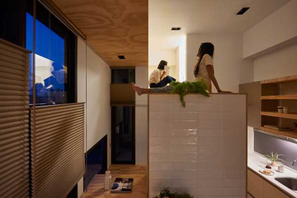 33 Square Meters Compact House with Innovative Vertical Architecture and Natural Decor