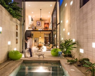 Raw House – Maximizing Vertical Space and Light on a Narrow Lot
