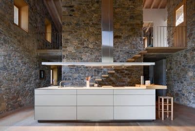 Rebuilding and Extension of the Farmhouse Can Calau