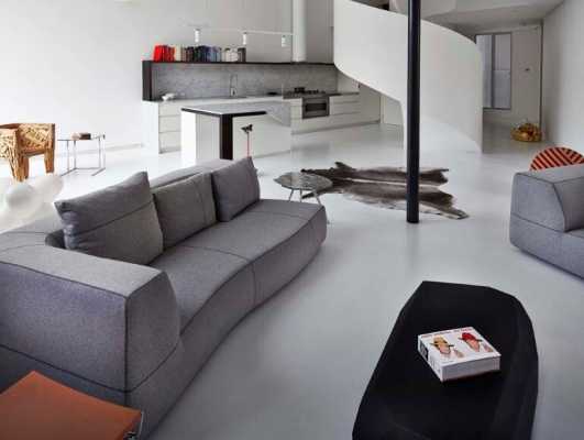 Dramatic Loft Apartment with Curvalicious White Interior