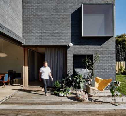 This Black Brick House Features Generous Spaces with a High Degree of Flexibility