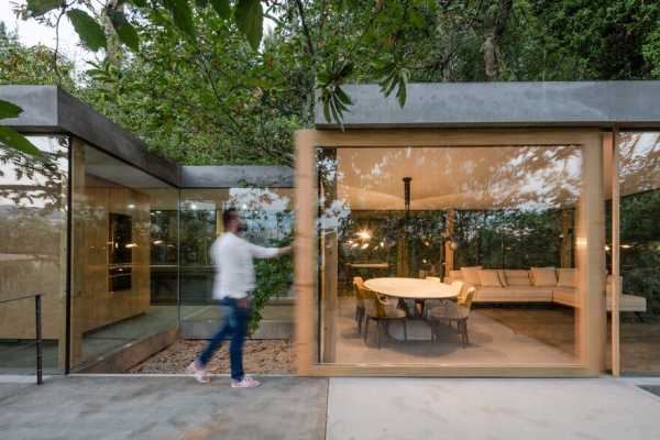 Cloaked House Perched Above A Steep Cliff in Marco de Canaveses, Portugal 10