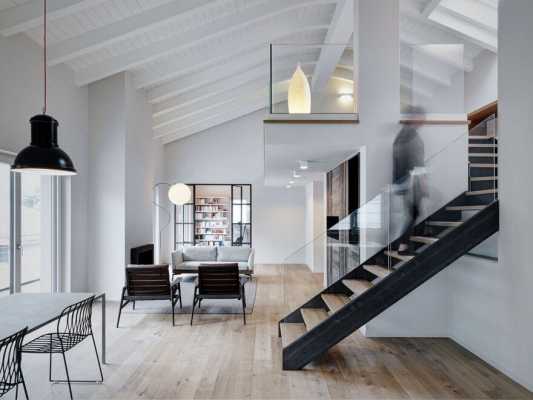 Stefano Viganò Designed a Double-Height Loft with an Industrial Personality