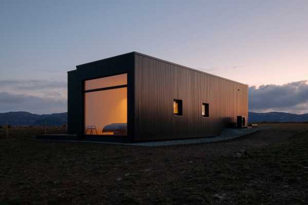 Modern Vacation Cabin Modeled on Traditional Scottish Longhouses