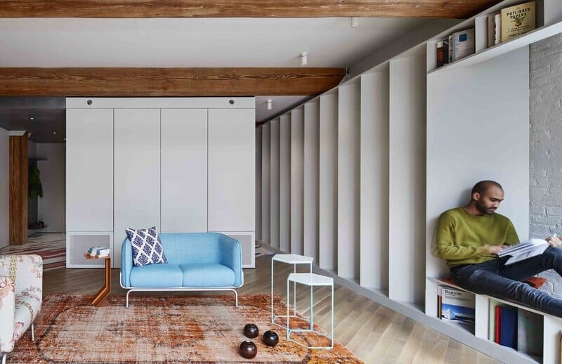 This Small Williamsburg Loft Elegantly Incorporates a Collection of 2,500 Books