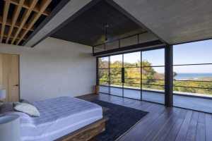 Charred Timber House Frames Views of the Pacific Ocean in Costa Rica