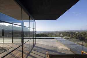 Charred Timber House Frames Views of the Pacific Ocean in Costa Rica