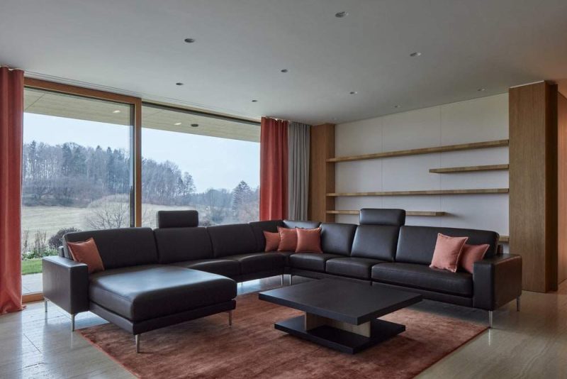 A Stone-Clad Villa Built into a Slope in Bohemian Paradise