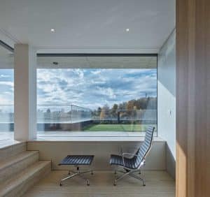 A Stone-Clad Villa Built into a Slope in Bohemian Paradise