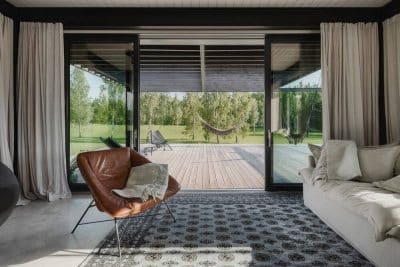 Sleek Pavilion-style Weekend House in Rural Latvia