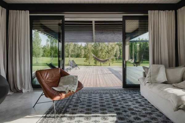 Sleek Pavilion-style Weekend House in Rural Latvia