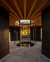 Net Zero House Equipped with a Green Roof and Sustainable Bathhouse