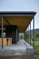 Net Zero House Equipped with a Green Roof and Sustainable Bathhouse