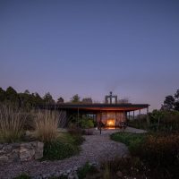 Net Zero House Equipped with a Green Roof and Sustainable Bathhouse