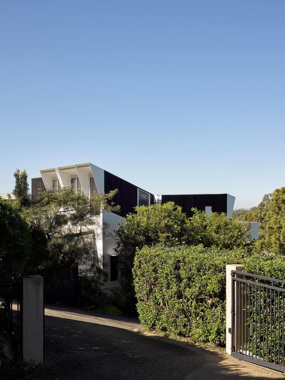 Ashgrove Hillside House by Kieron Gait Architects