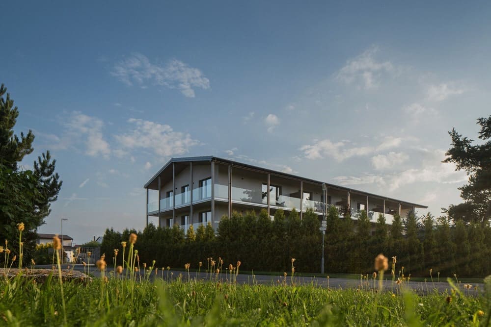 Apartment Building at the Foot of the Hill